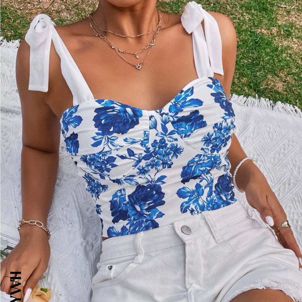 Blue and white floral crop tank with adjustable bow straps
